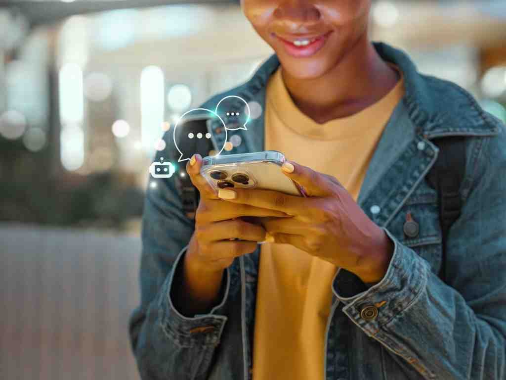 a woman holding a phone