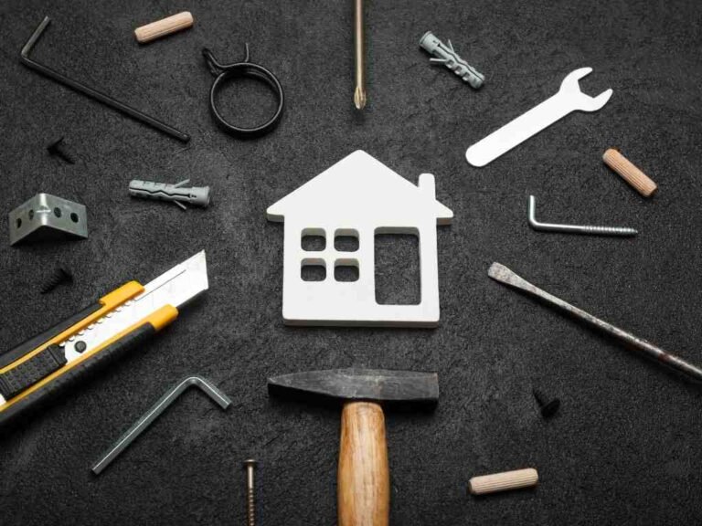 a white house with tools around it