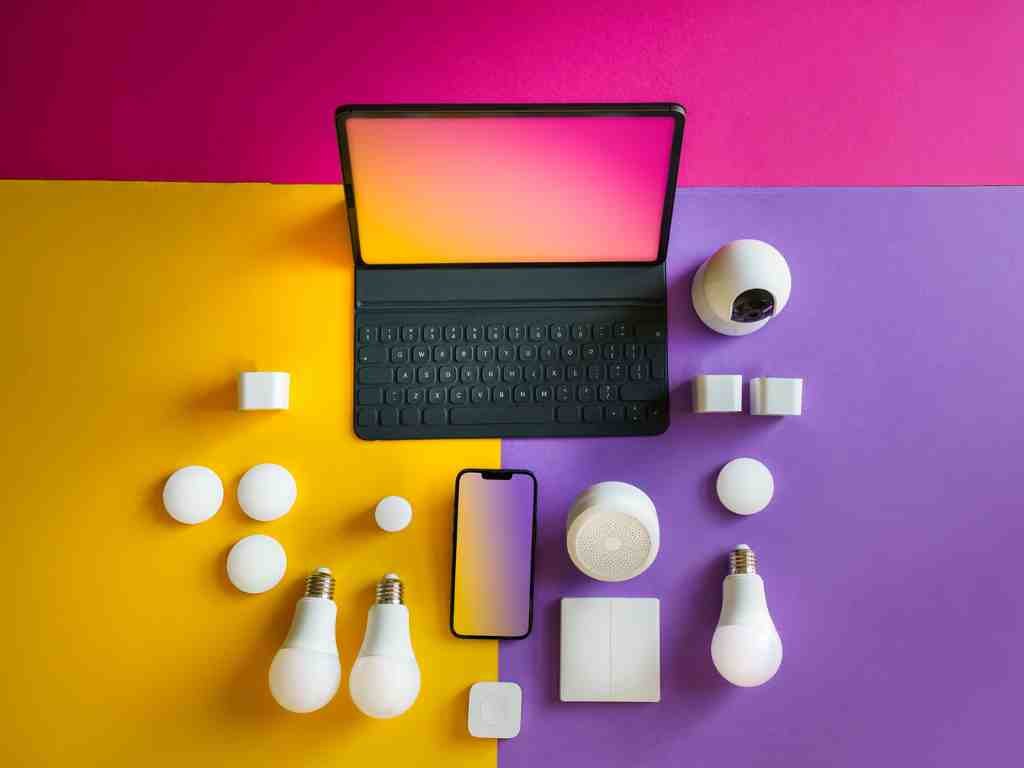 a laptop and various light bulbs